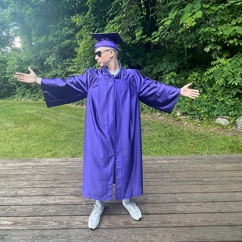 proud graduate in purple 
